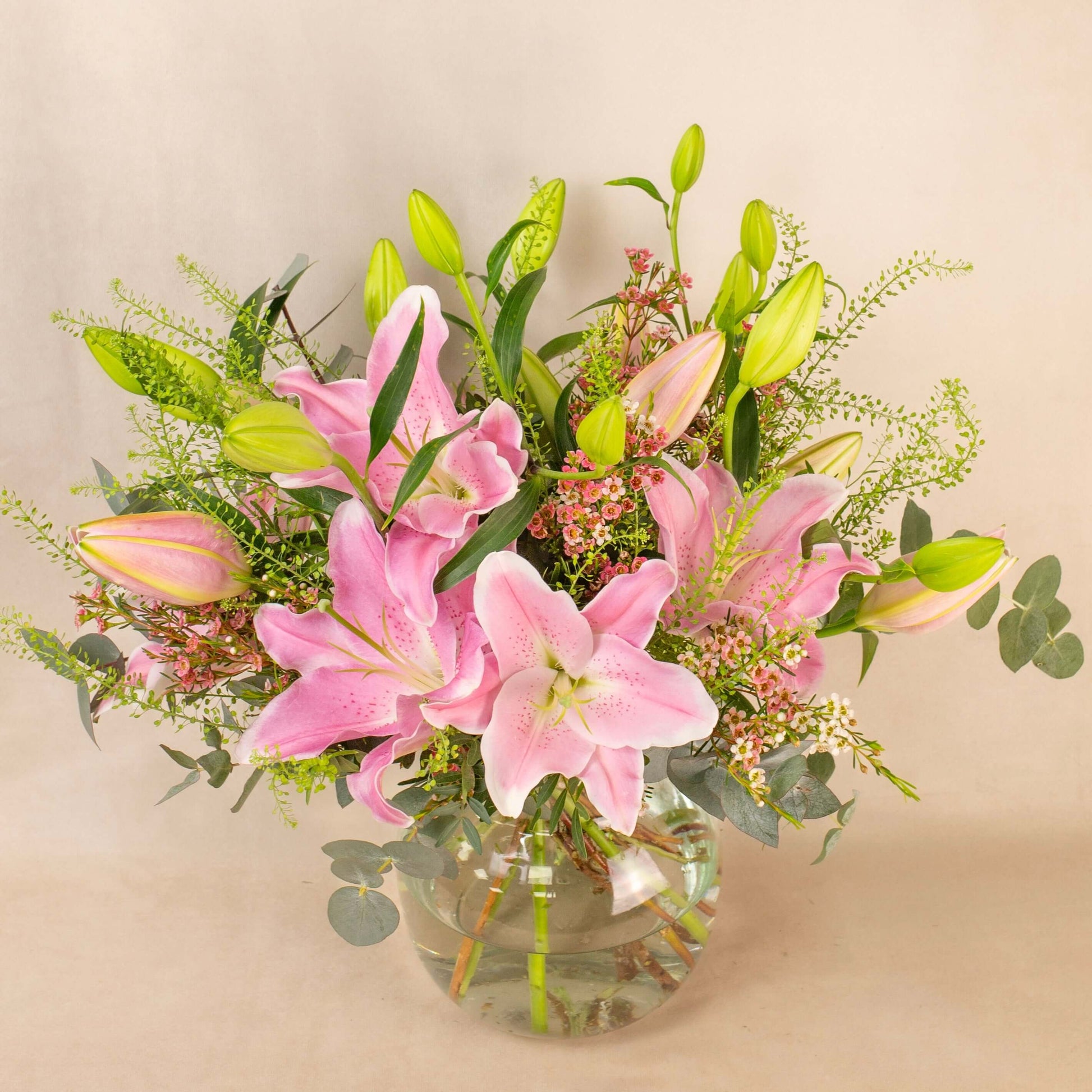 Pink lilies scented flowers greenery hand-tied bouquet white eucalyptus