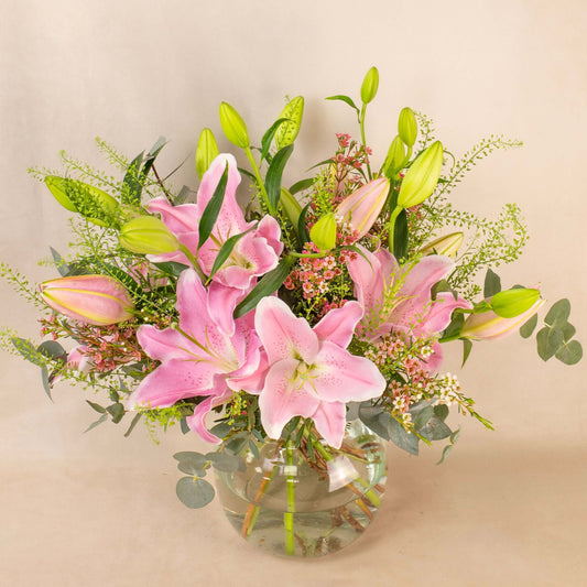 Pink lilies scented flowers greenery hand-tied bouquet white eucalyptus