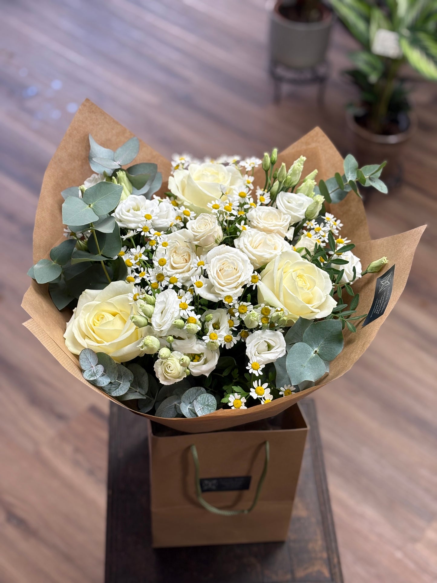 White flower bouquet roses lisianthus wedding birthday sympathy