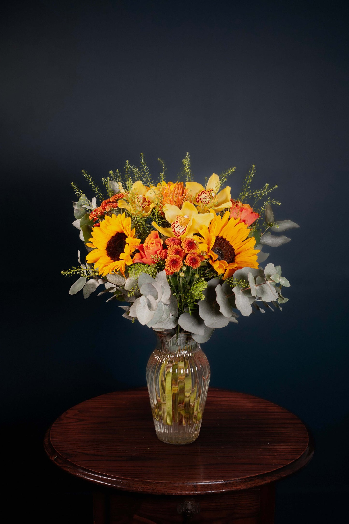 bright yellow orange flowers sunflowers roses exotic bouquet floral arrangement 